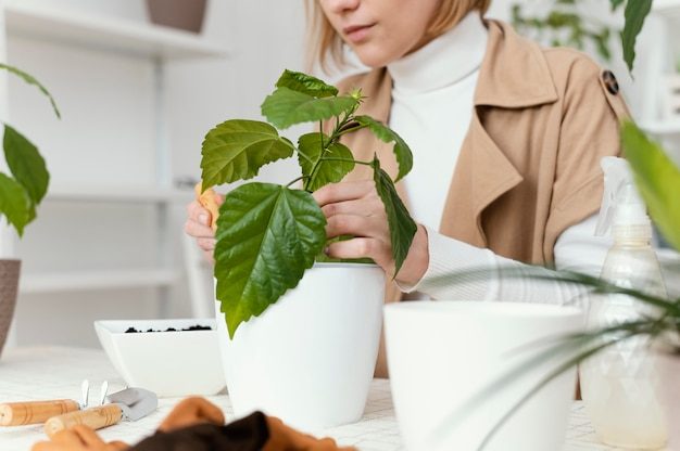 close-up-woman-gardening_23-2148826100-2060546