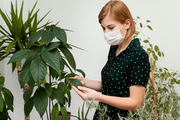 medium-shot-woman-wearing-medical-mask_23-2148826042-7355250