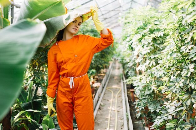 portrait-female-gardener-standing-banana-leaf-greenhouse_23-2147918633-9058108