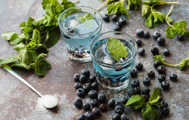 berries-mint-around-refreshing-blueberry-drinks_23-2148102550-4748424