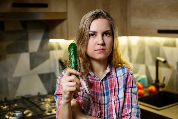 girl-with-beautiful-figure-holds-vegetables_173815-3044-2211255