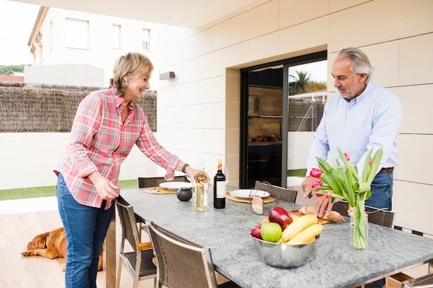 senior-couple-having-breakfast-garden_23-2148060189-1365850